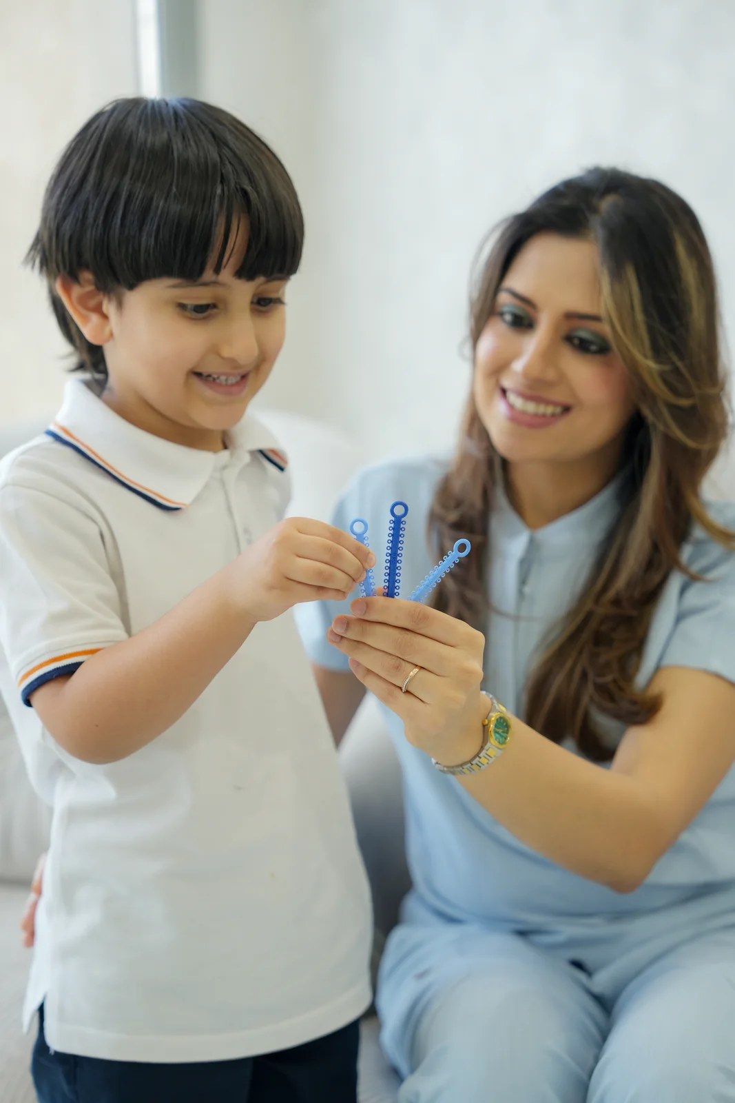 Dr. Fiza Quadri making a child’s orthodontic visit comfortable and engaging